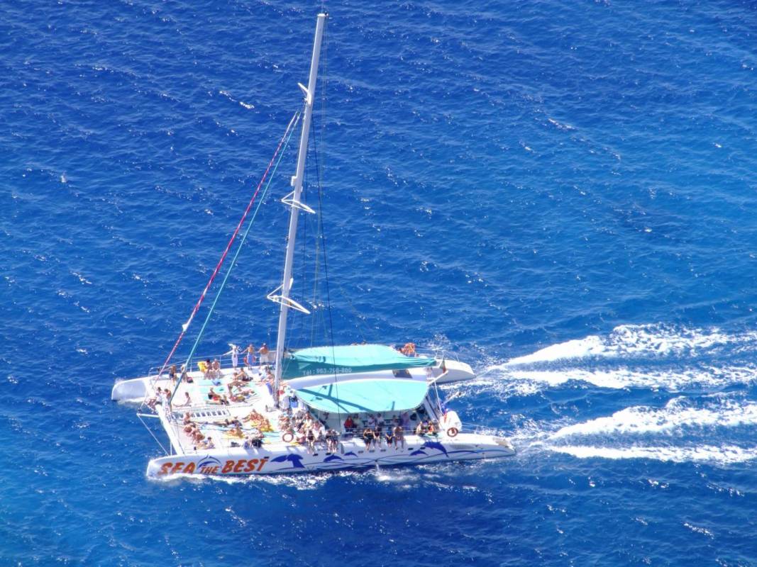 Sunset On Catamaran On The Madeira Island
